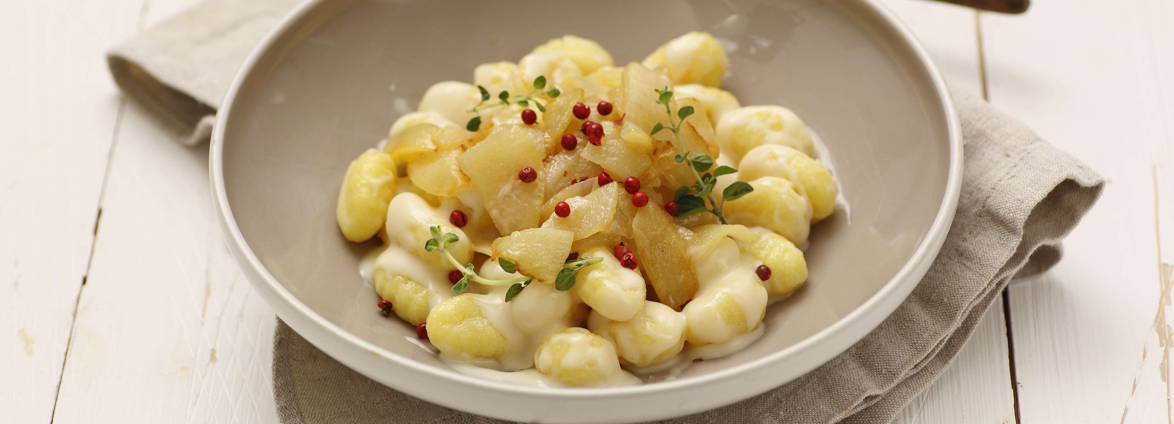 Umido di gnocchi in fonduta alle pere